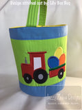 Tractor pulling cart of easter eggs applique machine embroidery design