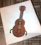 Guitar with face applique machine embroidery design