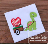 Dinosaur pulling cart with heart appliqué machine embroidery design