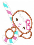 Gingerbread girl with candy cane appliqué machine embroidery design