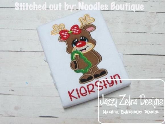 Girl reindeer holding cookie cutter appliqué embroidery design